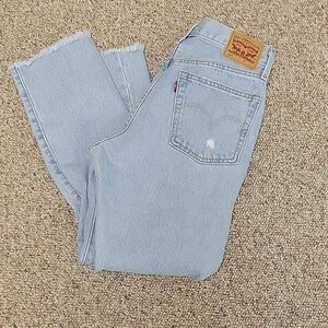 Levis 501 5 pocket light wash destructed jeans. Sz 26 x 26. Raw hem women's